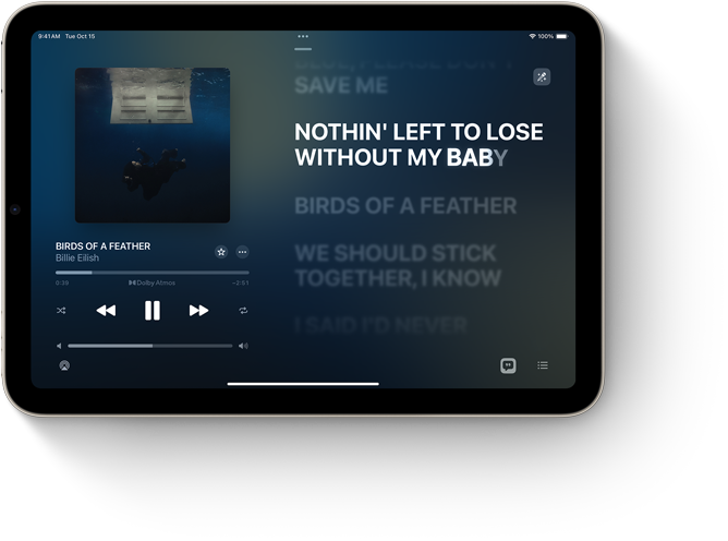 iPad mini в хоризонтална позиция, показващ Lyrics в Apple Music.