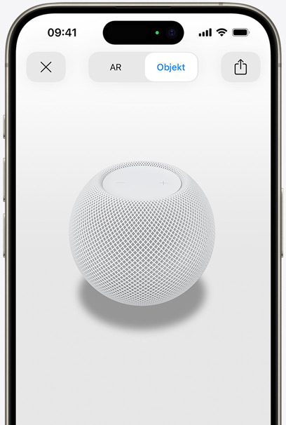 Der HomePod in Weiß auf dem Display eines iPhone in AR Ansicht.