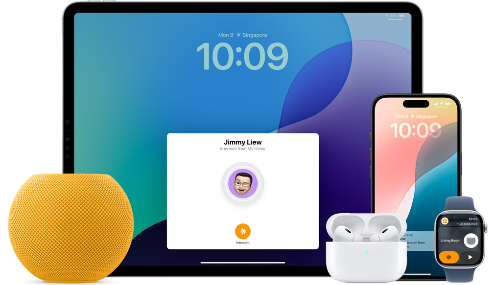 Yellow HomePod mini, an iPad, AirPods in a case, an iPhone and an Apple Watch with a pink strap are arranged.