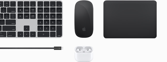 Kolekce příslušenství včetně Magic Keyboardu, Magic Mouse, Magic Track Padu, kabelu Thunderbolt 4 Pro a AirPodů Pro.